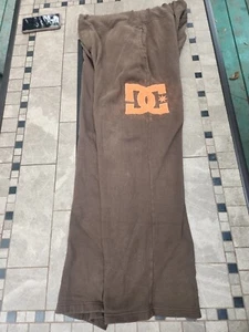 Pantalones deportivos vintage DC Shoes marrón y naranja pequeño agujero por bolsillo medianos para hombre - Imagen 1 de 9