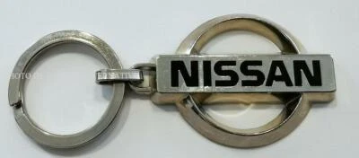 Porte clé metal NISSAN automobile voiture officiel keychain clef pichard balme - Photo 1/2