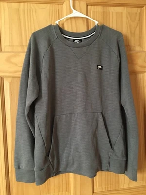 Pullover para mujer talla mediana Nike cuello redondo gris Foto 1 de 4