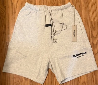 Pantalones Cortos Essentials Fear Of God Light Avena Talla LG Foto 1 de 4