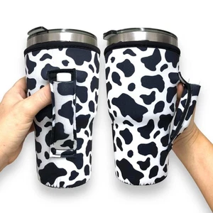 Manejador de vaso™ con estampado de vaca blanco y negro de 30 oz - Imagen 1 de 1