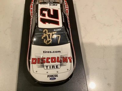 RYAN BLANEY AUTOGRAPHED 2025 FORD MUSTANG DISCOUNT TIRE DIECAST & CARD - Image 1 of 4