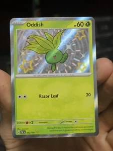 Oddish 092/091 - Paldean Fates Shiny Rare Holo Pokemon TCG NM/LP - Picture 1 of 4