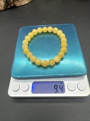 Pulsera de cuentas de ámbar báltico natural de 9 mm 9,4 g 原矿俄料蜜蜡满蜜微飘花圆珠手串 Foto 1 de 4