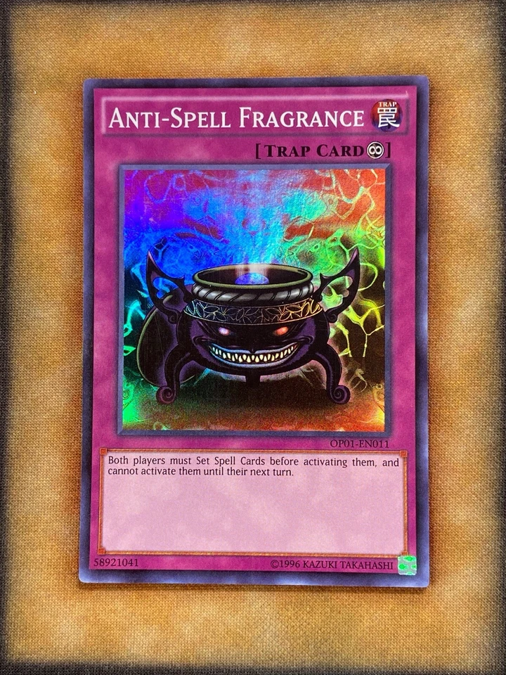 Fragancia antihechizos Yugioh OP01-EN011 súper rara LP Foto 1 de 1