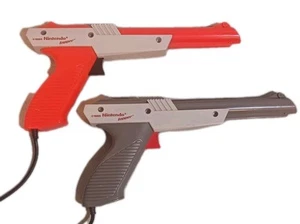 Set Of 2 Nintendo NES-005 Zapper Light Guns Orange & Grey Versions OEM UNTESTED - Picture 1 of 4