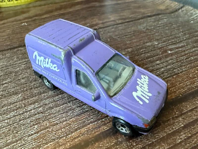 Ford Courier Milka Chocolate 1:54 Vintage Diecast modelo de coche juguete Matchbox 1991 Foto 1 de 4