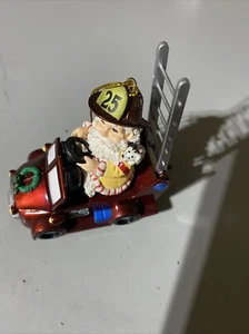 Fireman Santa in in Fire Truck Car. Ornament - Picture 1 of 3