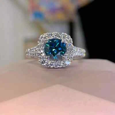 Anel de noivado halo haste dividida topázio azul corte redondo 2 quilates acabamento em ouro branco 14K - Imagem 1 de 4