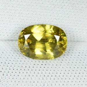 2.08 ct SHIMMERING BROWNISH YELLOW SPARKLING NATURAL SPHENE Oval See Vdo EBY - Picture 1 of 2