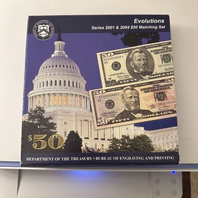 Evolution Series 2001 & 2004 $50 Bills. identical SN #'s one 50 stared low SN# - Image 1 of 4