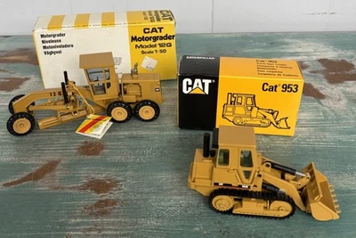Cargador tipo oruga CatvCaterpiller 953 + multi niveladora 12G - con caja 1:50 - como nuevo Foto 1 de 4