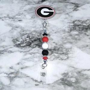 Zubehör für Ihren Ausweis mit UGA Bulldogs einziehbare Abzeichenrollen | Ausweis Abzeichen Rolle - Bild 1 von 4