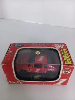 1997 COCA COLA 600 (1 OF 10,080) CHEVROLET MONTE CARLO 1:64 WITH STAND REVELL - Image 1 of 4
