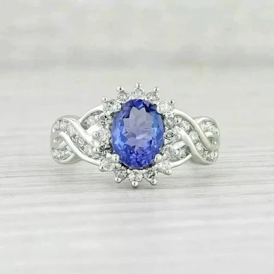 Anillo de boda con halo de tanzanita azul corte ovalado de 2,54 quilates de oro blanco de 14 quilates Foto 1 de 4