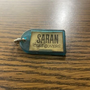 vtg SARAN SEAT COVERS keychain “keep Your Car Young” -b - Picture 1 of 5