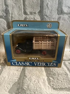 NEW ERTL VINTAGE VEHICLES 1930 CHEVY STAKE TRUCK 1/43 SCALE #2503 - Image 1 of 4