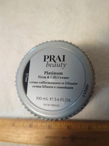 Crema de noche Prai Platinum Firm & Lift, sin caja sin sello, puede mostrar signos de almacenamiento - Imagen 1 de 4