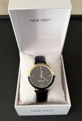 Reloj Nine West con correa para mujer dorado y negro Foto 1 de 4