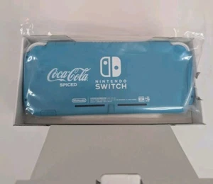 Nintendo Switch Lite - Coca Cola Spiced Rare Special Edition COLLECTOR Turquoise - Picture 1 of 5