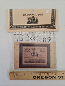 Told in a Garden SETTLERS SAMPLER Cross Stitch Pattern by Marilyn Leavitt Imblum - Picture 1 of 3