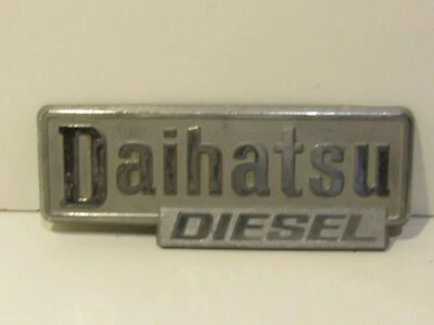 Daihatsu Diesel EMBLEM BADGE SCRIPT TRIM NAMEPLATE Plastic - Image 1 of 2
