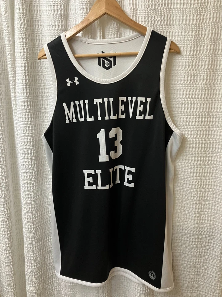 Camiseta deportiva reversible de baloncesto UA Under Armour Elite 13 blanca negra Foto 1 de 4