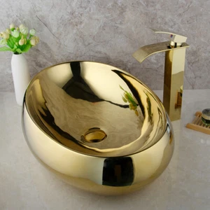 Juego de drenaje de grifo mezclador de oro ovalado de cerámica para lavabo - Imagen 1 de 6