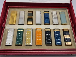 A RARE COLLECTION OF A 'Must de Cartier' lighter complete set, by Cartier - Picture 1 of 3