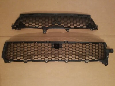 Juego de 2 piezas de parachoques delantero MITSUBISHI OUTLANDER 2010-2013 rejilla inferior superior nuevo par Foto 1 de 4