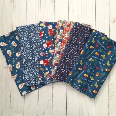 Juego de 6 cuartos de grasa de algodón de vacaciones de Navidad azul Santa copo de nieve bastón de caramelo Foto 1 de 4