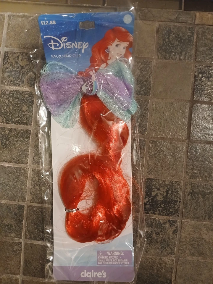 Claire's Disney's The Little Mermaid Hair Clip with Curled Faux Red Ariel hair - Image 1 of 1