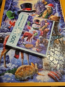 Rompecabezas de trozos y piezas 300 piezas ** ¿Quién está decorando al muñeco de nieve? ** - Imagen 1 de 11
