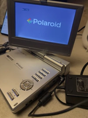 Reproductor de DVD portátil Polaroid PDM-0723 pantalla giratoria/remoto Foto 1 de 4