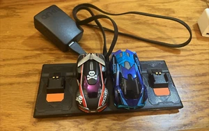 ANKI Overdrive Cars Lot Of 2 With Charge Dock - Ground Shock & Skull Works - Picture 1 of 3