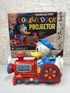 Proyector de película 1969 Pato Donald Transograma Disney Tren Juguete Roto Sin probar - Imagen 1 de 11