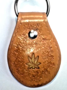 Leather key Fob -1 Canna Leaf + Abstract back ground made by a Vet.** - Picture 1 of 6