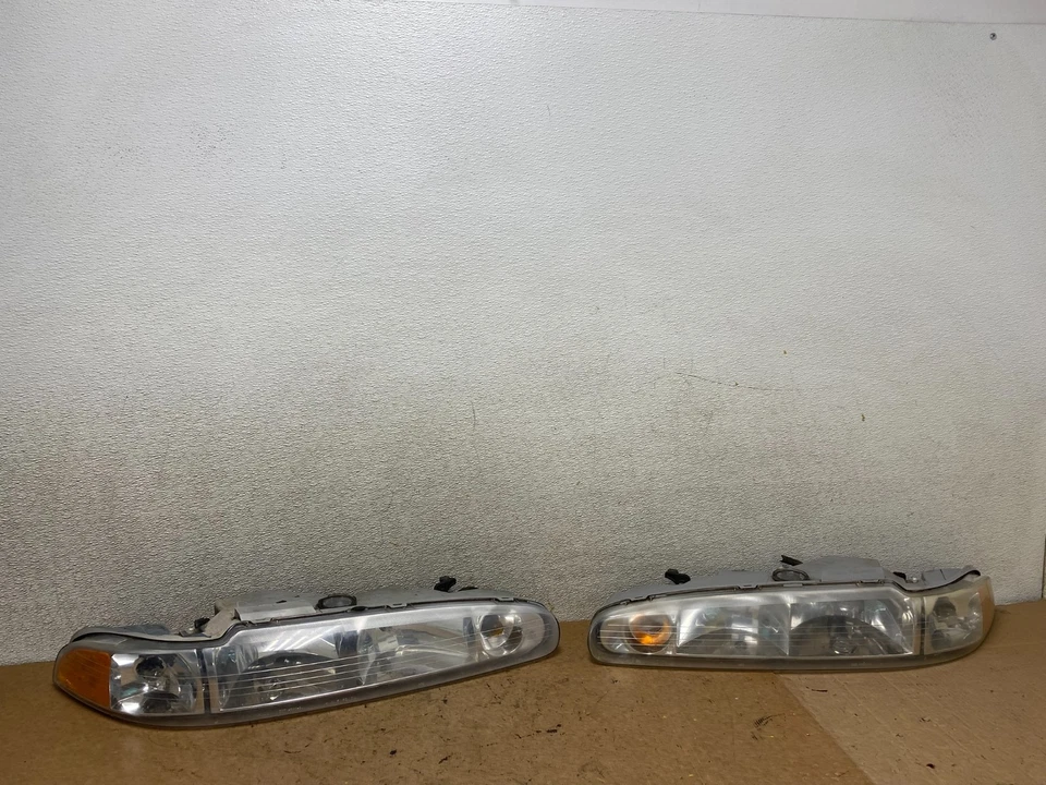 1998 to 2002 Oldsmobile Intrigue Left+Right Side Halogen Headlights S9401 DG - Image 1 of 4