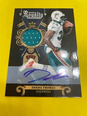 2011 PANINI CROWN ROYALE ROOKIE ROYALTY JERSEY AUTO DANIEL THOMAS 20/100 #23 - Image 1 of 4