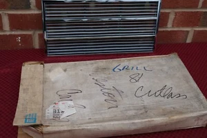 1981 OLDSMOBILE CUTLASS CRUISER STATION WAGON NOS LH CHROME GRILLE GM 22506431 - Picture 1 of 10
