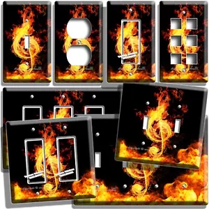 CHIAVE TRIBALE NOTA IN FIAMME INTERRUTTORE LUCE USCITA PARETE PIASTRA MUSICA STUDIO ARTE ARREDAMENTO - Foto 1 di 34