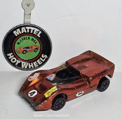 De colección 1968 Hot Wheels Redline McLaren M6A naranja metálico EE. UU. con botón  Foto 1 de 4