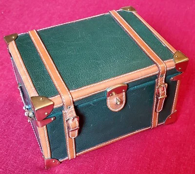 Mini baúl o monedero Emilio Pucci envuelto en cuero verde Foto 1 de 4