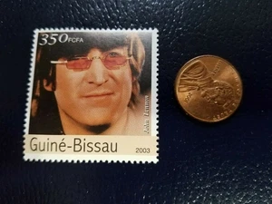 John Lennon Beatles Singer Performer 2003 Guine-Bissau Perforated STAMP - Picture 1 of 1