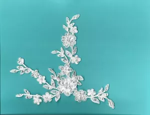 Weiße Perlen- und Schnürspitzenapplikationen für Hochzeitskleider - Bild 1 von 3