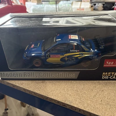 1/18 Subaru Impreza WRC Winners Rally Japan 2004  P.Solberg Sun Star 4370 - Image 1 of 4