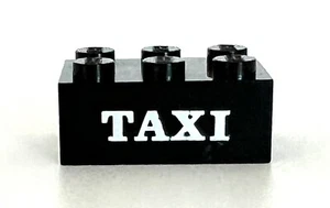 Lego BLACK 2x3 BRICK With White ‘ TAXI ‘ Serif Pattern Vintage - Picture 1 of 3
