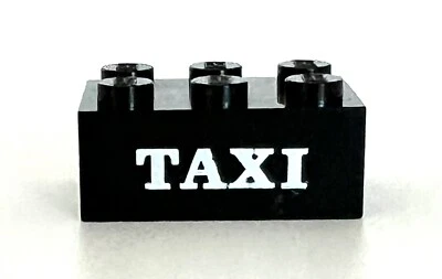 Lego BLACK 2x3 BRICK With White ‘ TAXI ‘ Serif Pattern Vintage - Image 1 of 3
