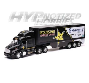 NEW RAY 1:32 PETERBILT MODEL 387 ROCKSTAR HUSQVARNA FACTORY RACING BLACK 10963 - Picture 1 of 2