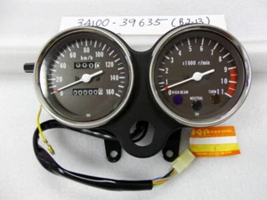 Suzuki GP125 Speedometer / Tachometer Assy NOS CLOCKS GAUGE KM/H OEM 34100-39635 - Picture 1 of 12